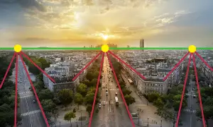Vue aérienne d'une avenue parisienne au coucher du soleil, avec des lignes rouges et des points jaunes illustrant l'effet de perspective.