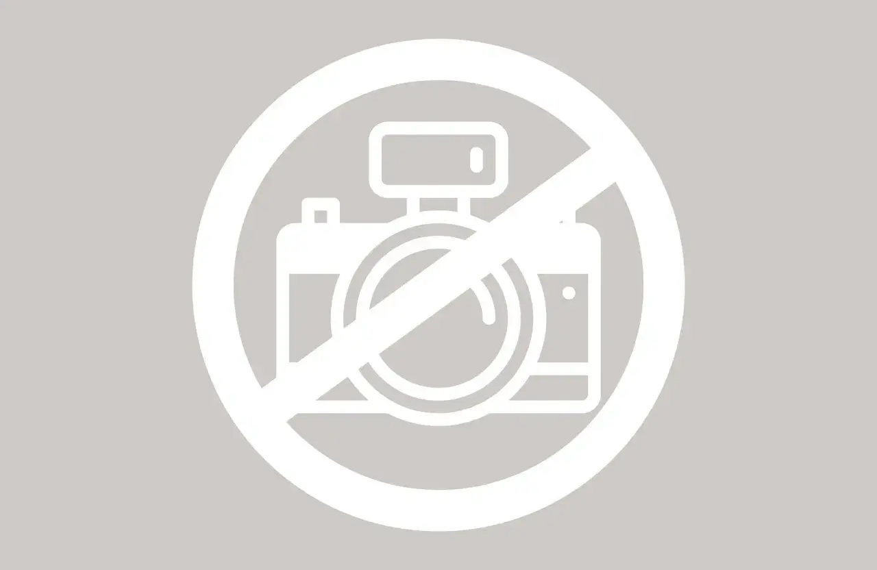 Icône de caméra barrée, symbolisant l'interdiction de photographier et le respect du droit à l'image.