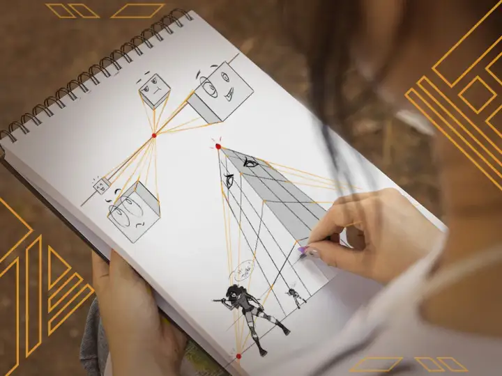 Une main dessine des cubes expressifs et une pyramide dans un carnet, explorant une **idée photo perspective** avec des lignes de fuite.
